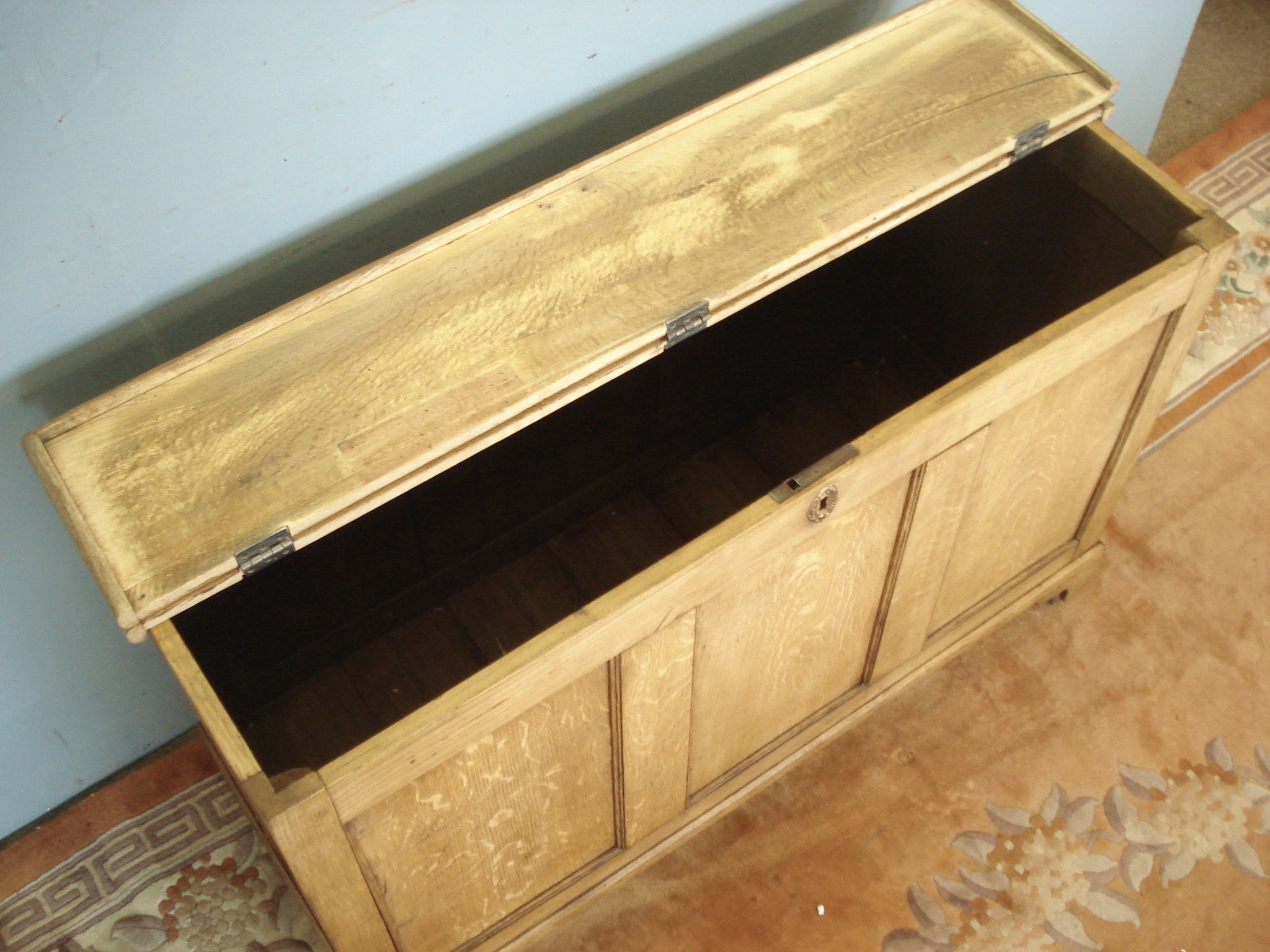 Panelled all around 19th Century Coffer with plain plank fold over lid