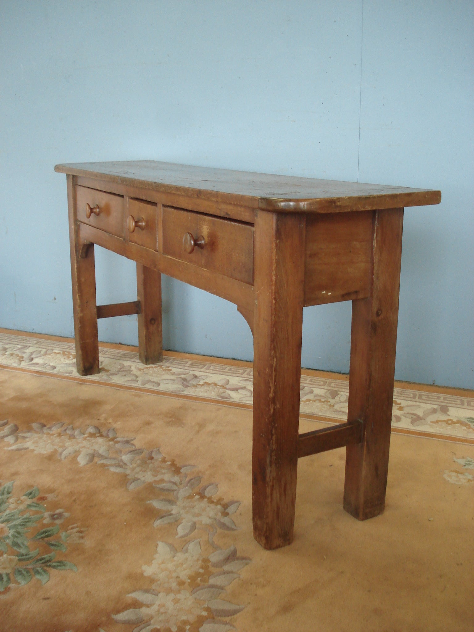 In its original finish:  A shallow 19th century dresser base / console table