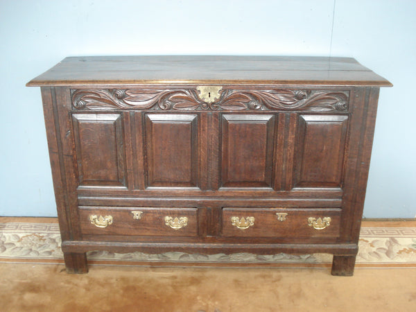 Circa 1800. Oak mule chest with rich deep patination.