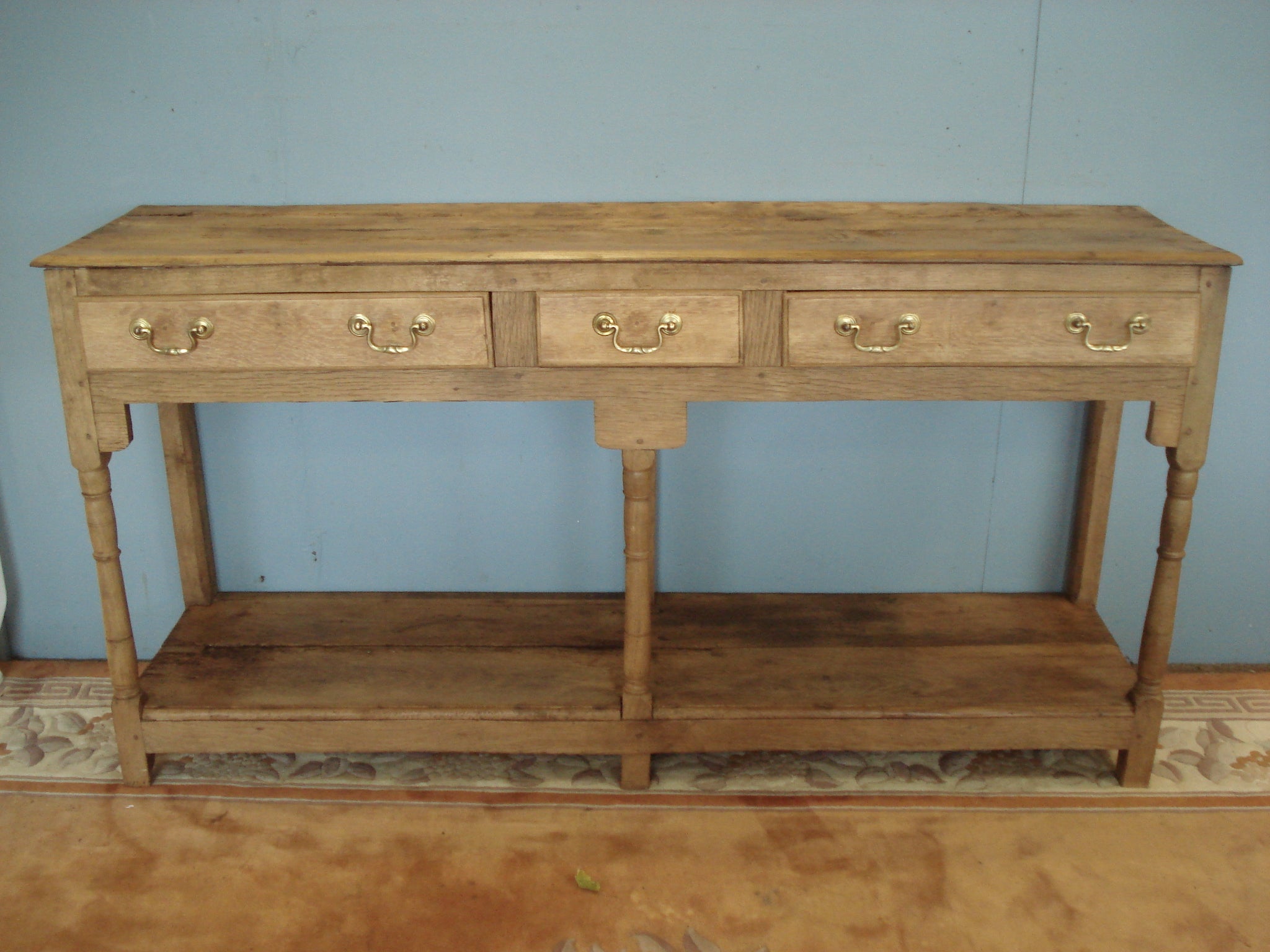 Early blonde oak potboard dresser base.