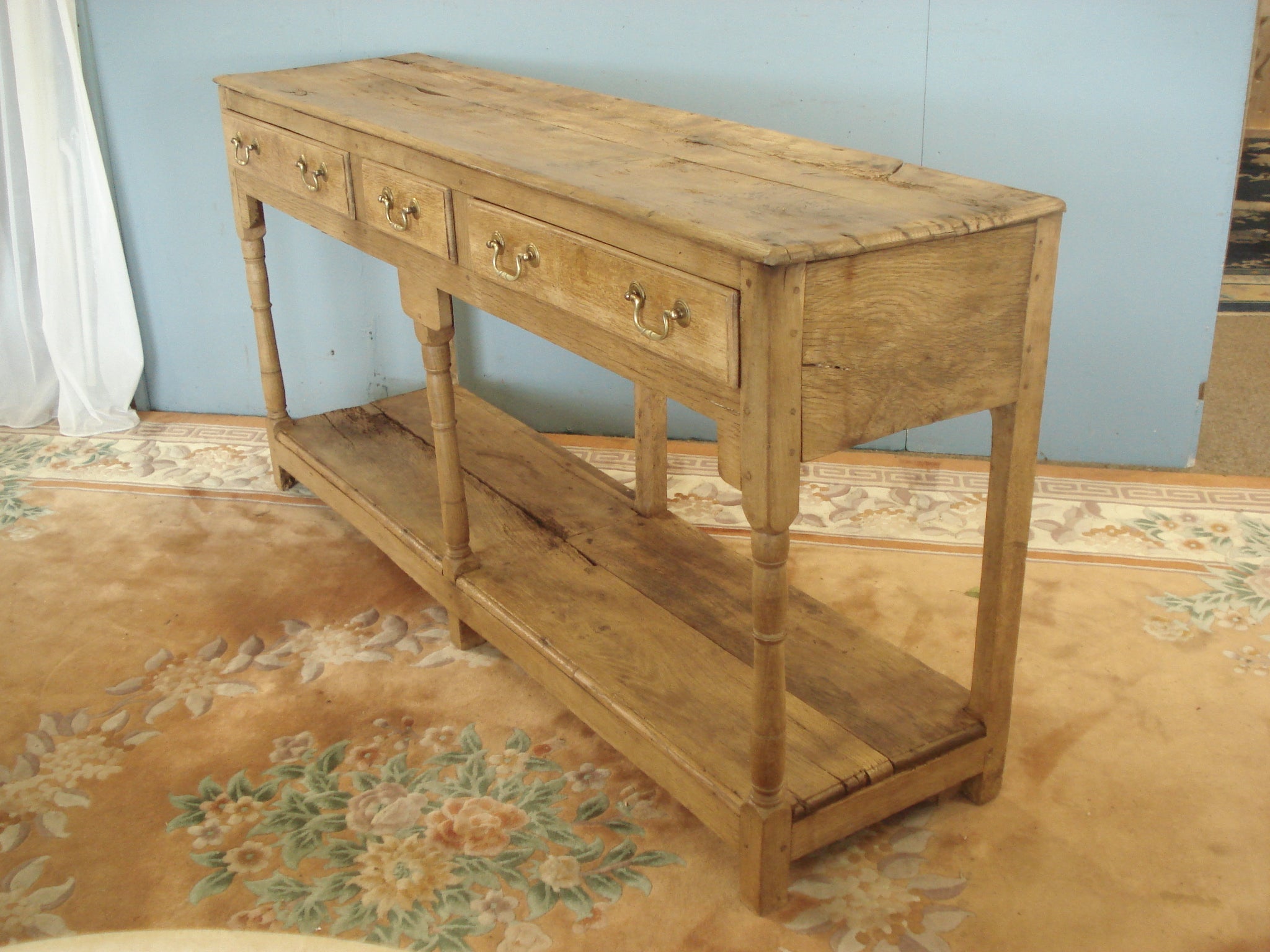 Early blonde oak potboard dresser base.