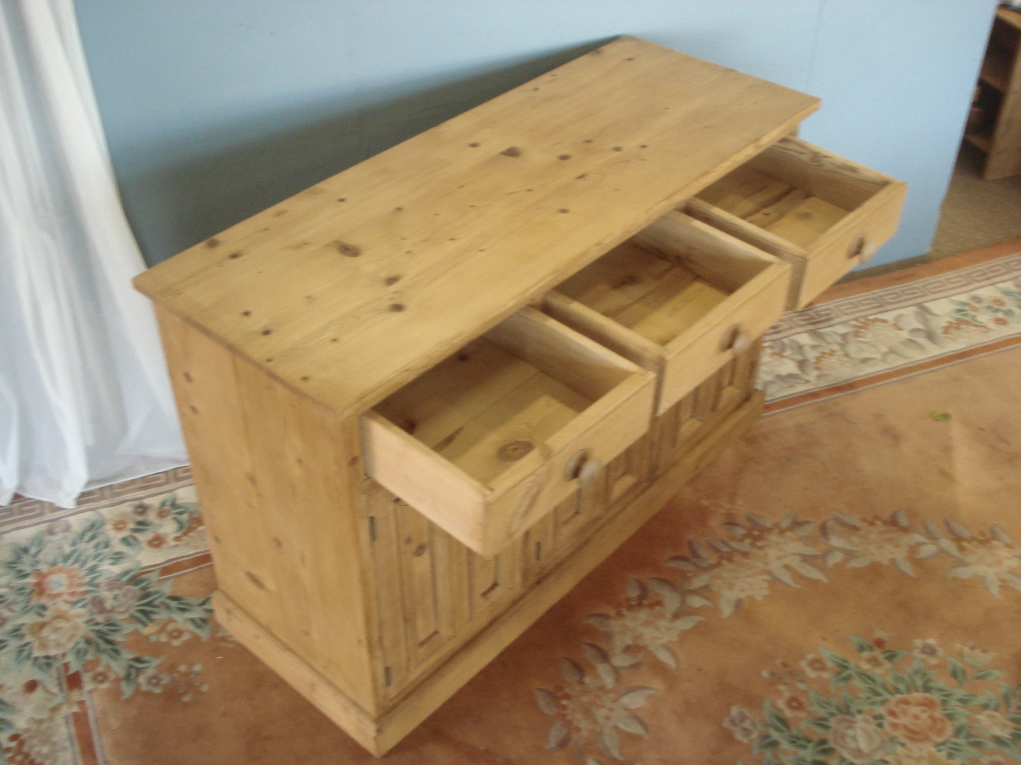 Stripped pine three drawer dresser base