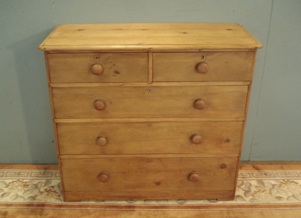 Original turned knobs to this C19th pine Five Drawer Chest