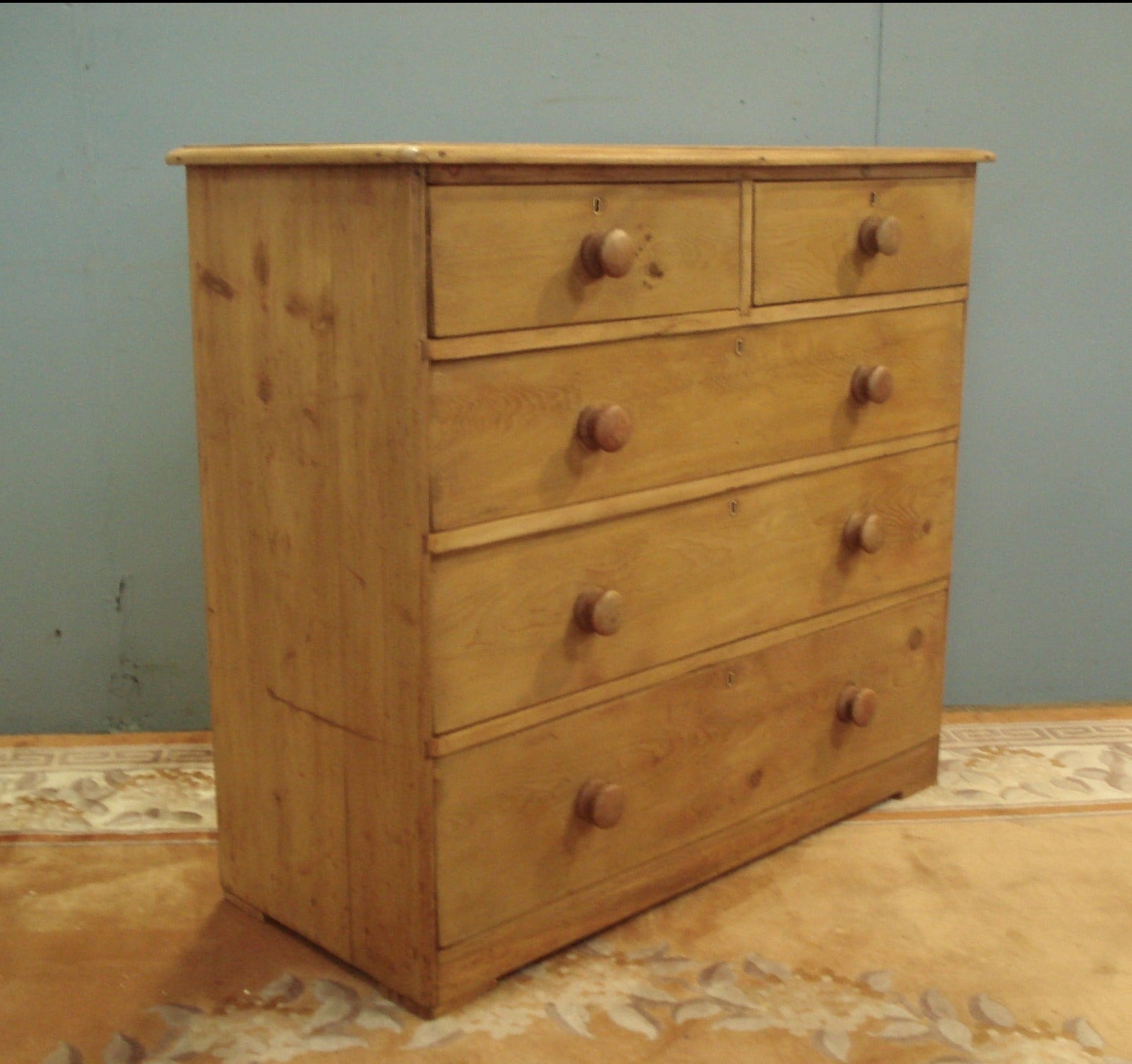 Original turned knobs to this C19th pine Five Drawer Chest