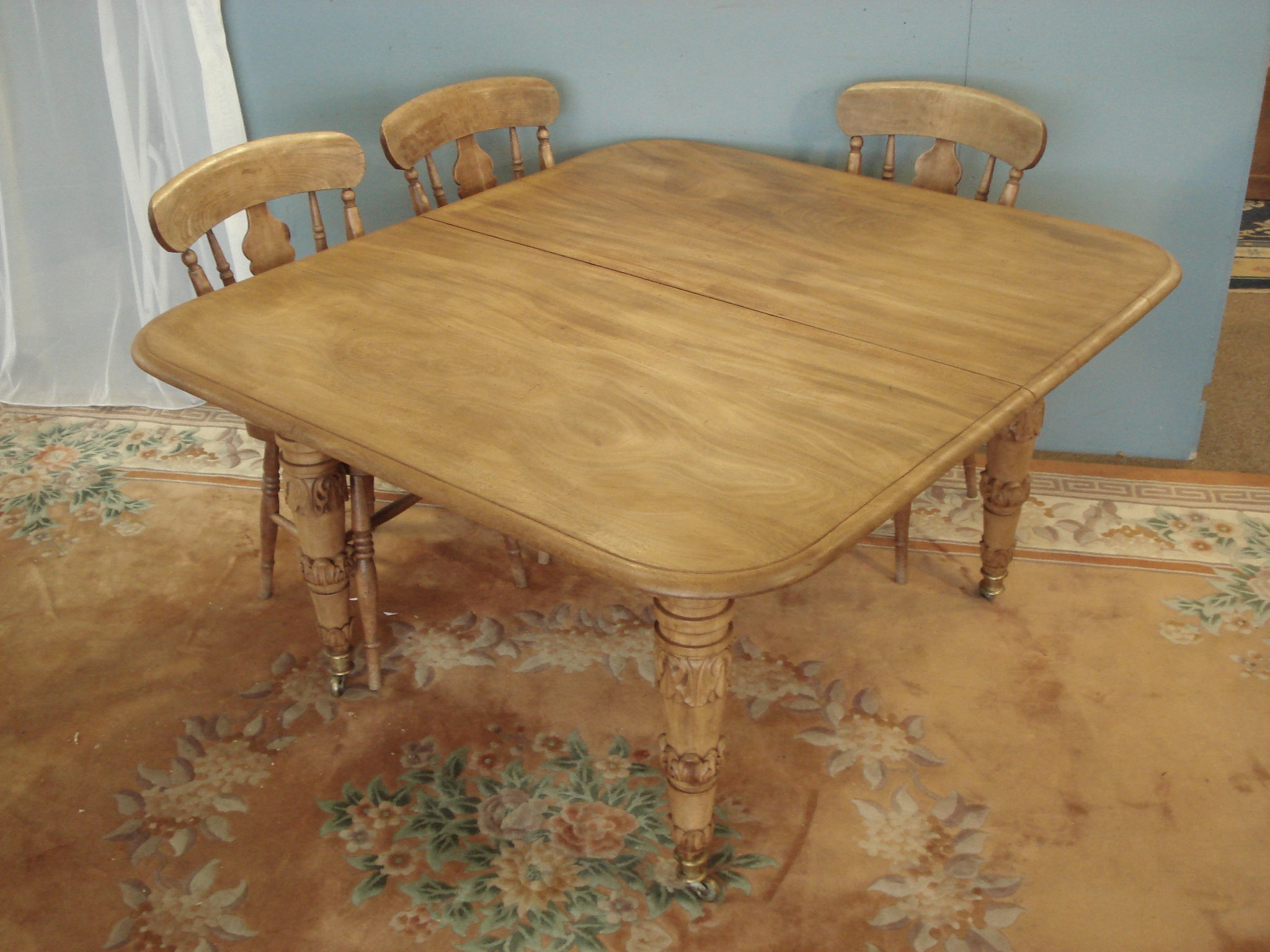 Extending Regency Blonde Mahogany table. 51" wide by 113" long max.