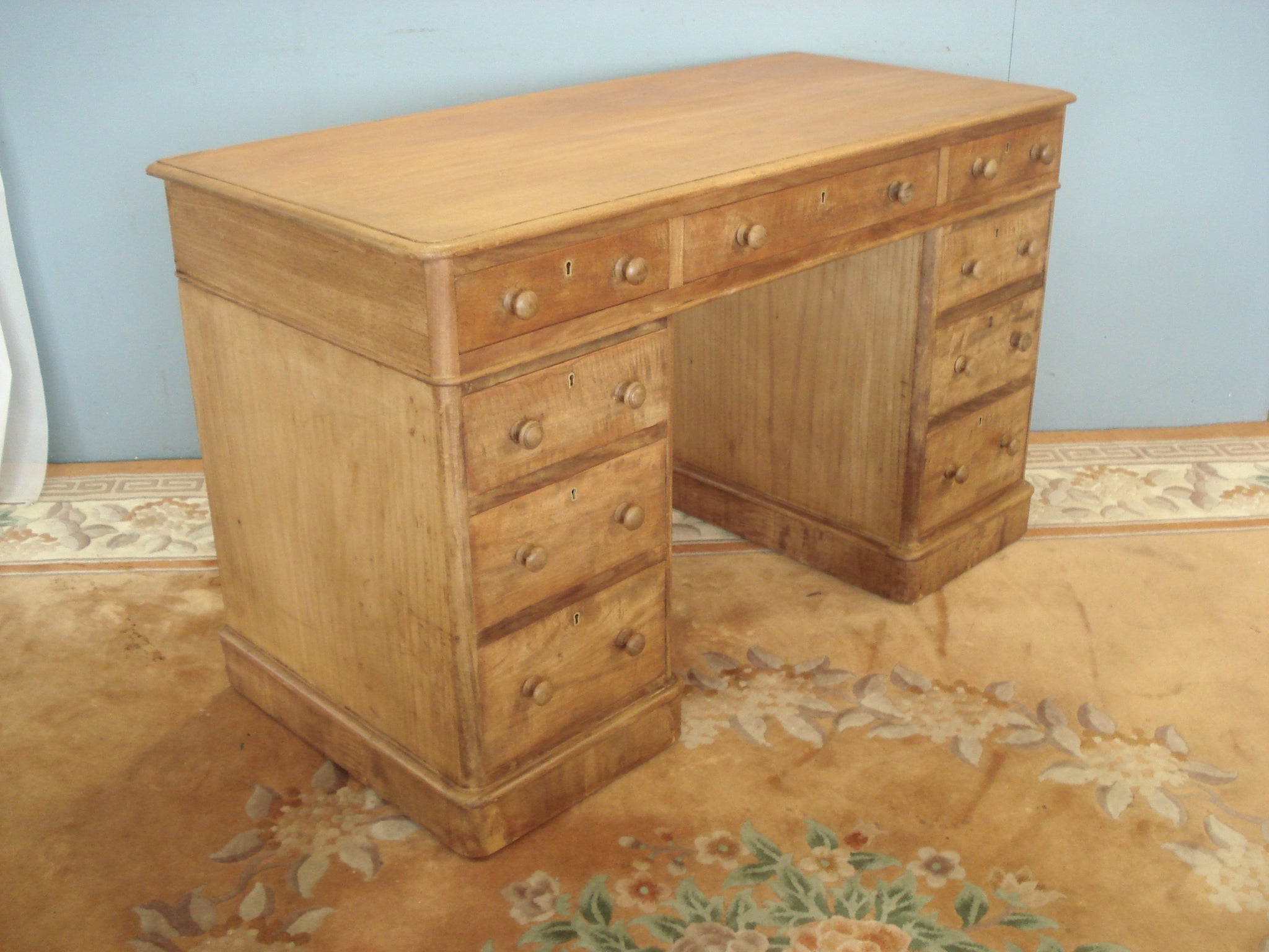 Pedestal  desk, blonde mahogany.