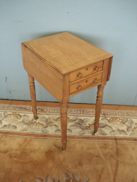 Dropleaf small blonde mahogany table with two drawers