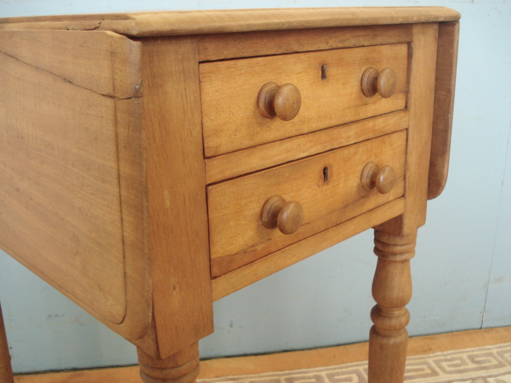 Dropleaf small blonde mahogany table with two drawers