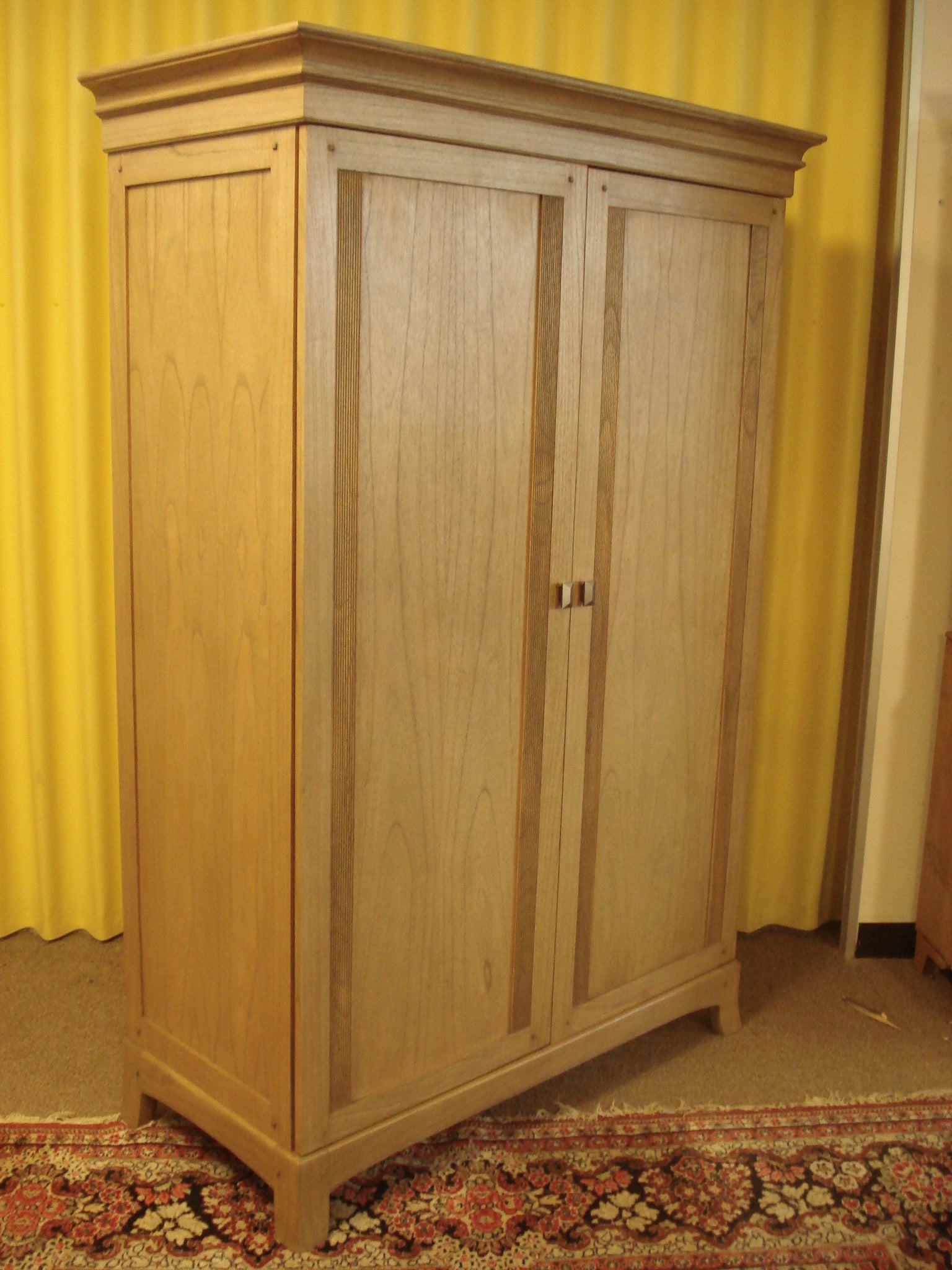Late century 'Winsor' double wardrobe. Dismantles for transport.